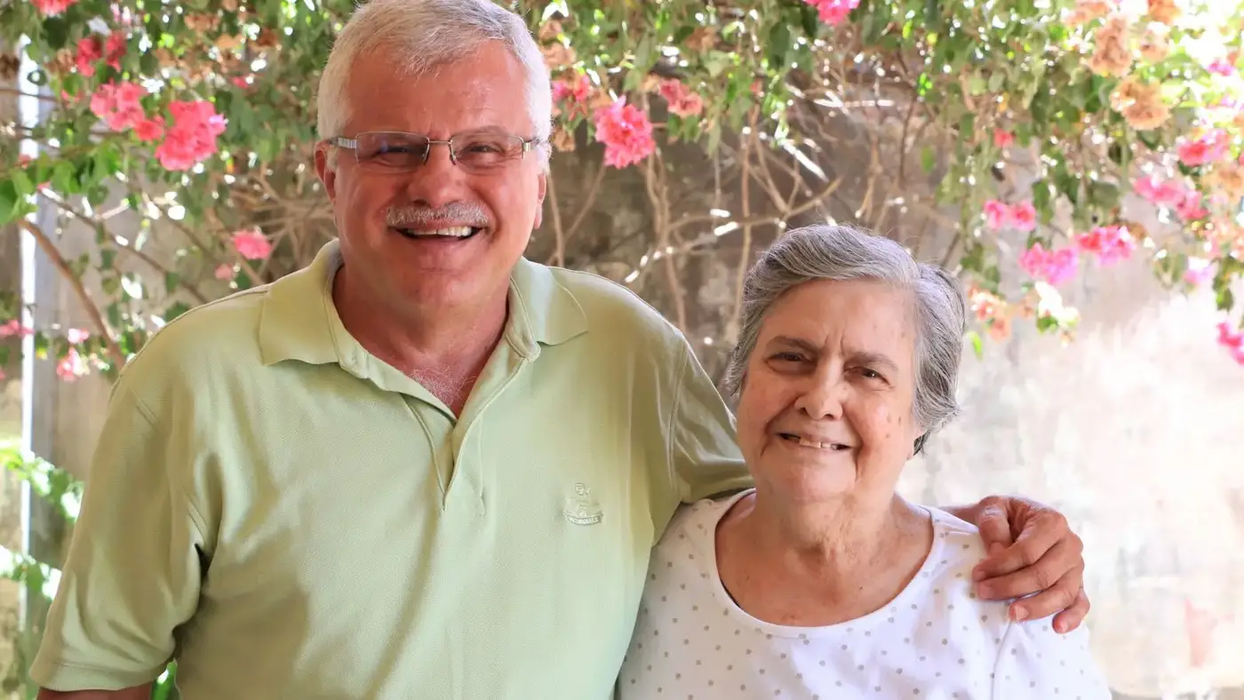 Older couple smiling outdoors